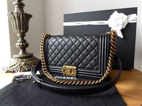 champagne gold chanel boy|Chanel black handbags.